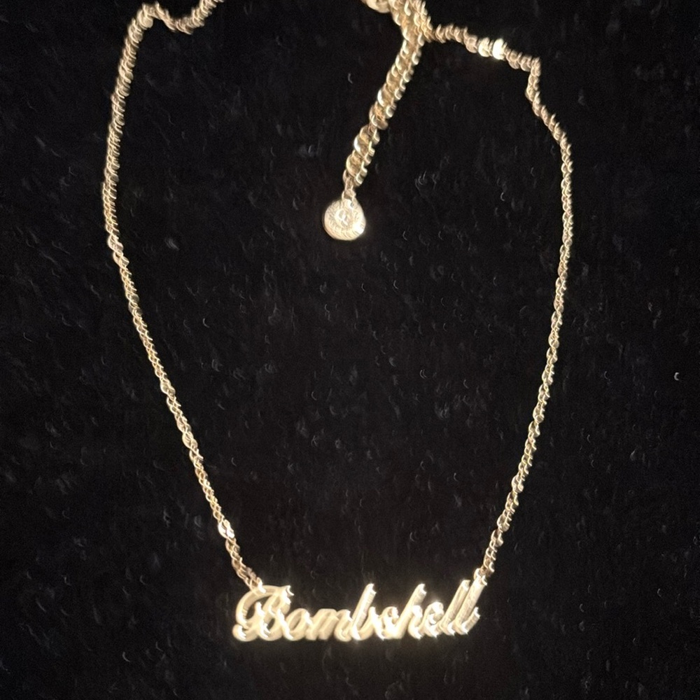 Victoria Secret gold plated necklacece with charm pendant. New.